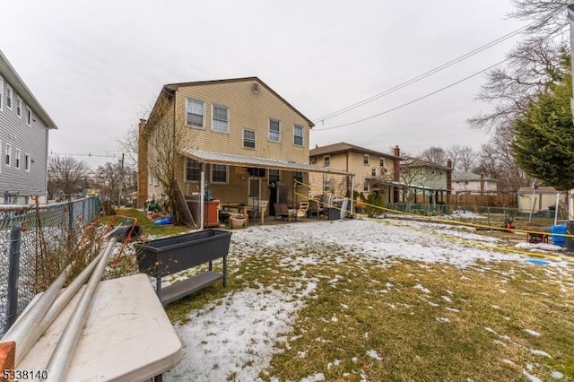 view of snow covered house