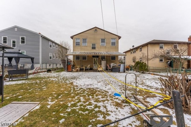 view of snow covered property