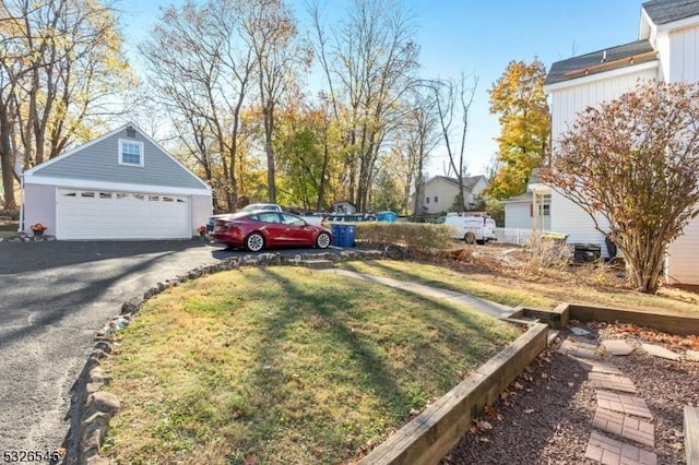 view of yard featuring a garage