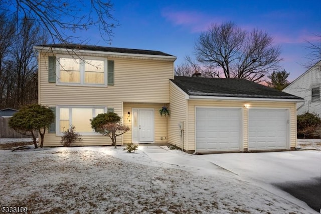 front of property featuring a garage