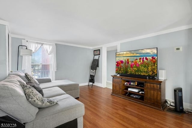 147 E Main St, Rockaway Boro, NJ 07866 - living room with crown molding, baseboards, and wood finished floors