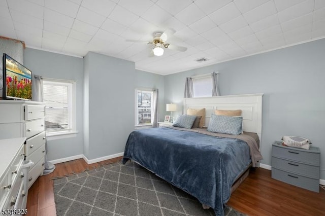 147 E Main St, Rockaway Boro, NJ 07866 - bedroom featuring dark wood-style floors, visible vents, ceiling fan, and baseboards