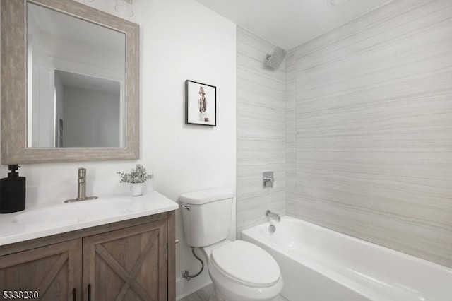 full bathroom featuring vanity, toilet, and tiled shower / bath combo