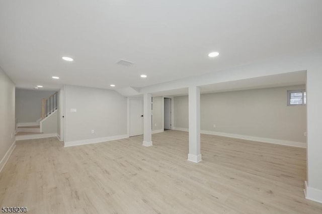 basement featuring light hardwood / wood-style flooring