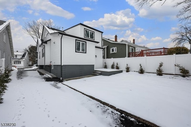 view of snow covered property