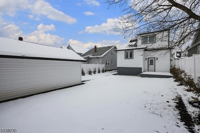 view of snow covered property