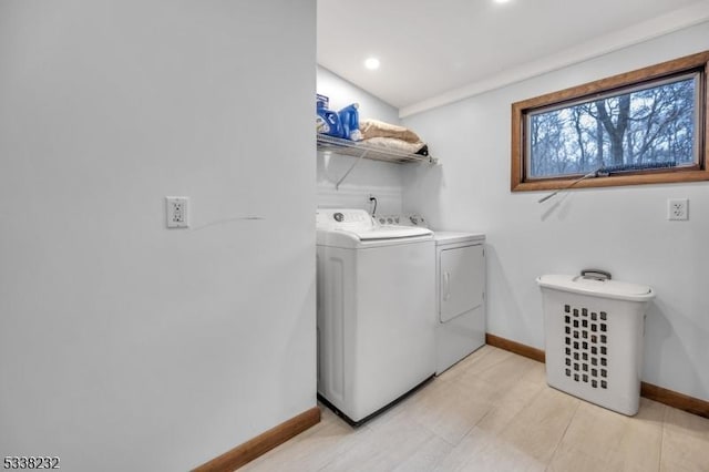 washroom featuring washer and dryer