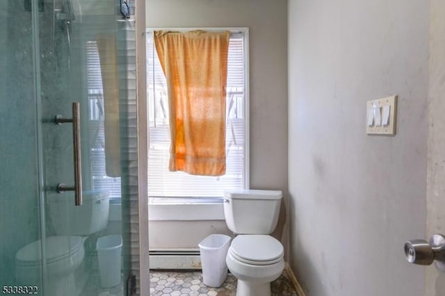 bathroom with walk in shower, a baseboard radiator, and toilet