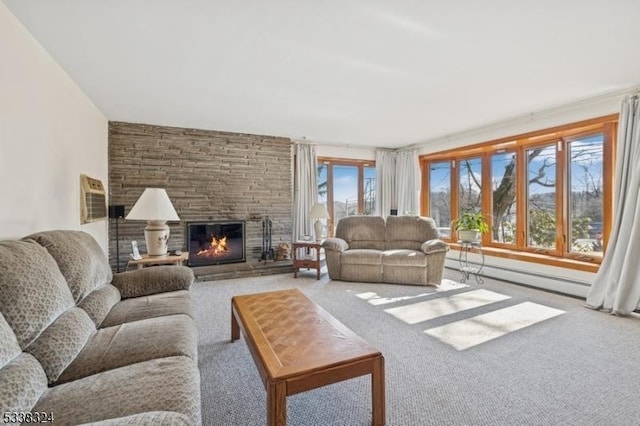 carpeted living area with a fireplace and baseboard heating