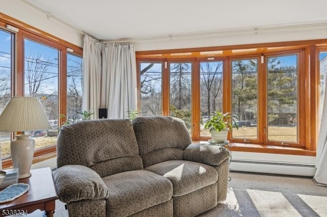 sunroom featuring baseboard heating