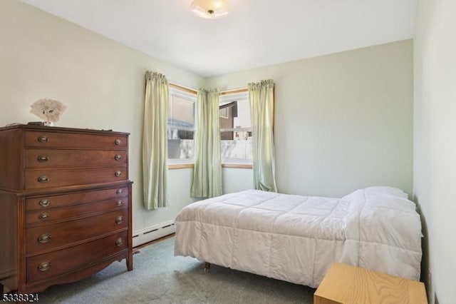 carpeted bedroom with baseboard heating