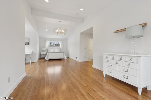 unfurnished bedroom featuring recessed lighting, baseboards, vaulted ceiling, and light wood finished floors