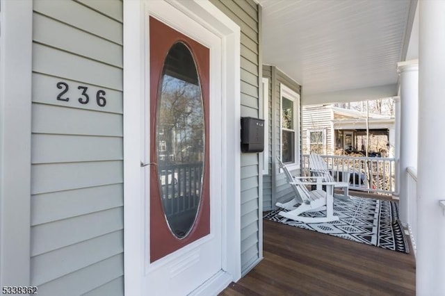 entrance to property with covered porch