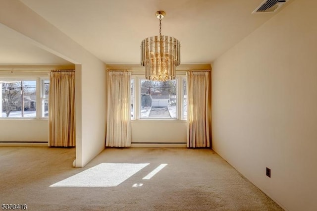 unfurnished dining area featuring light colored carpet and a notable chandelier