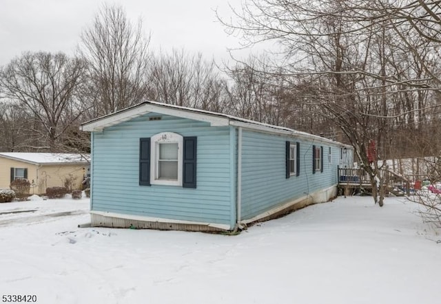 view of snow covered property