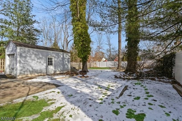 view of yard featuring an outbuilding and a fenced backyard