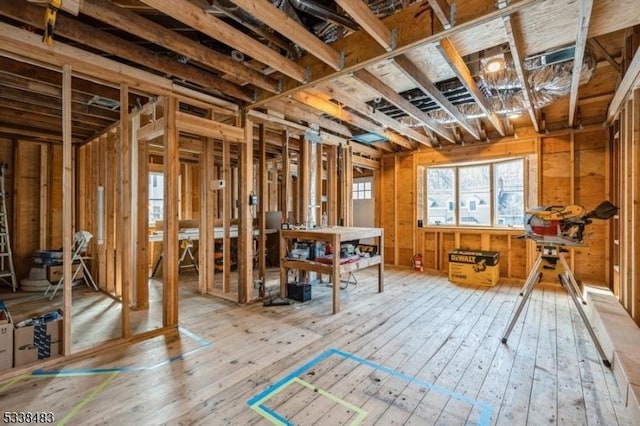 miscellaneous room featuring wood-type flooring