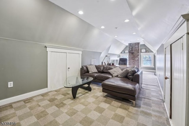 interior space with light carpet and lofted ceiling