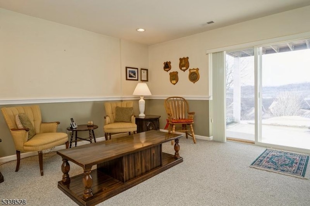 sitting room featuring recessed lighting, carpet flooring, visible vents, and baseboards