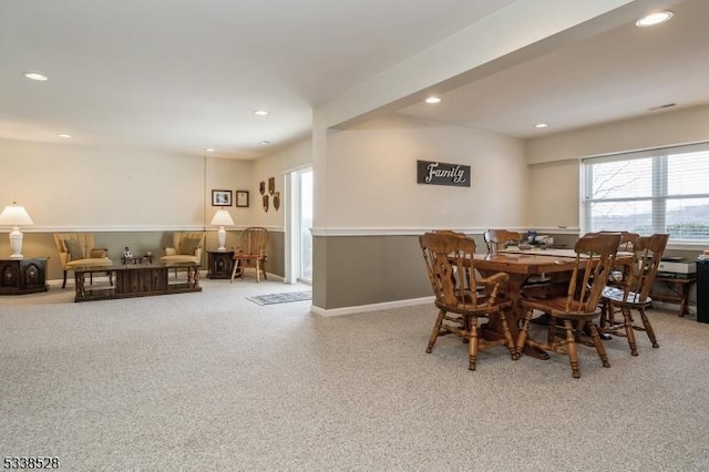 dining space featuring recessed lighting and baseboards