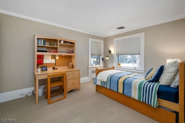 bedroom featuring visible vents, crown molding, light carpet, and baseboards