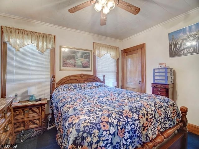 bedroom with ornamental molding and ceiling fan