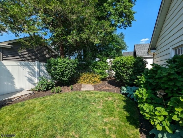 view of yard with fence