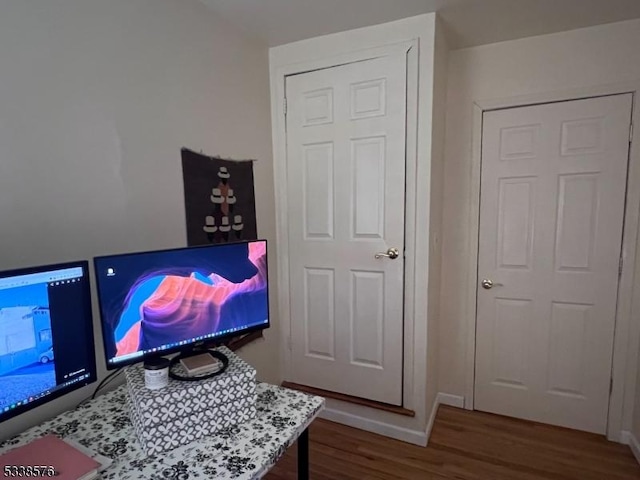 game room with wood finished floors