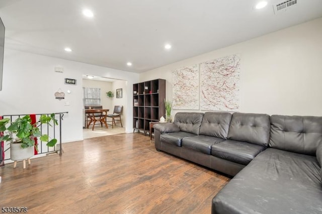 living room with hardwood / wood-style floors