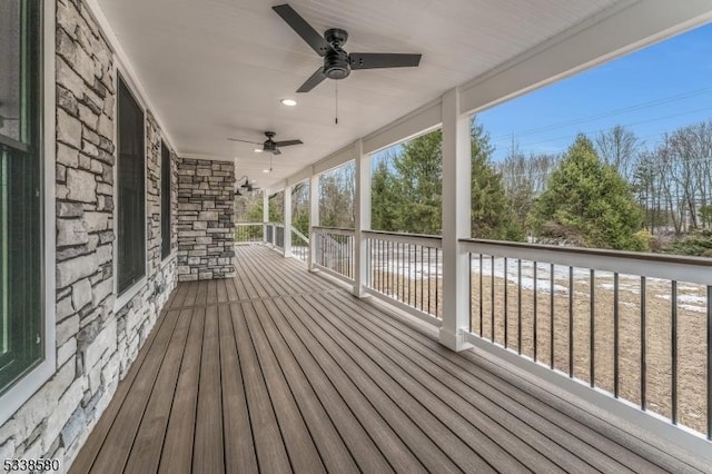 wooden terrace with ceiling fan