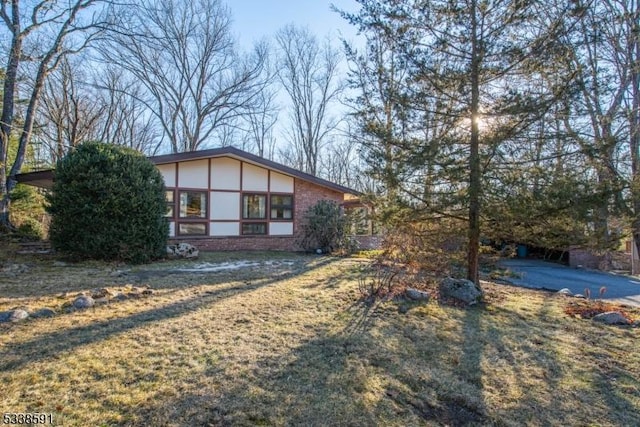 exterior space with brick siding