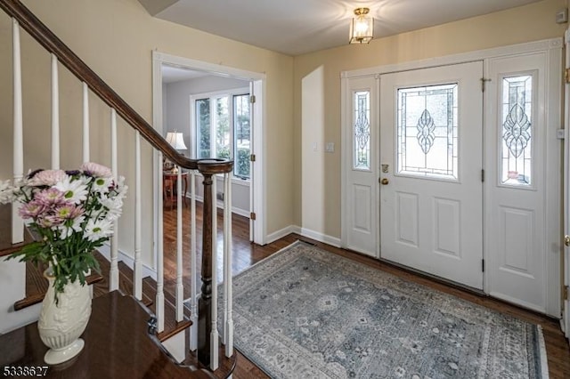 entrance foyer featuring dark hardwood / wood-style flooring