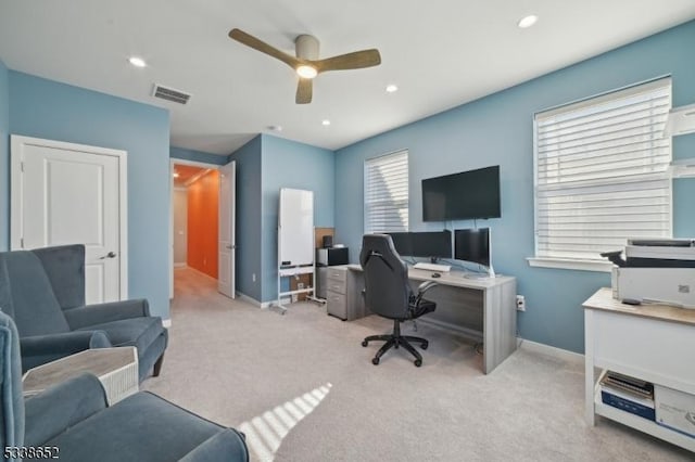 office area with baseboards, visible vents, light colored carpet, ceiling fan, and recessed lighting