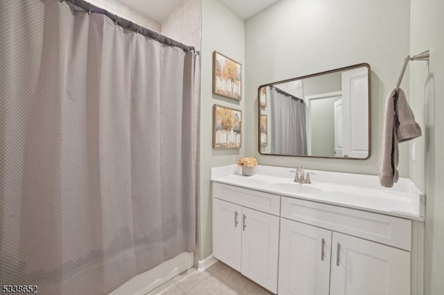 full bathroom featuring vanity and tile patterned floors