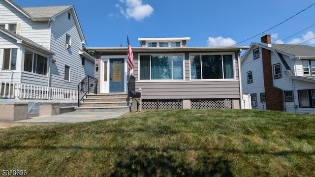 view of front of property with a front yard