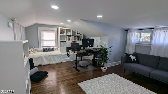 bedroom with lofted ceiling, recessed lighting, baseboards, and wood finished floors