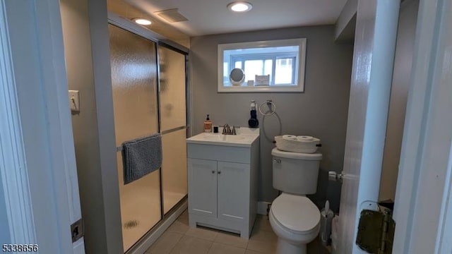 bathroom with tile patterned flooring, toilet, recessed lighting, vanity, and a shower stall