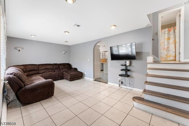 living room with light tile patterned floors