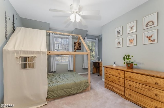 carpeted bedroom featuring a ceiling fan