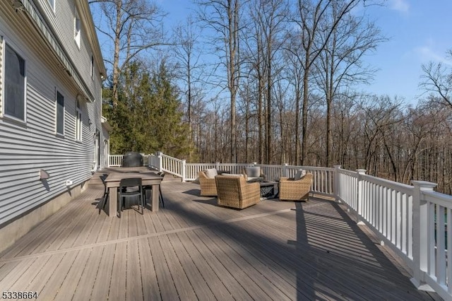 deck with outdoor dining space