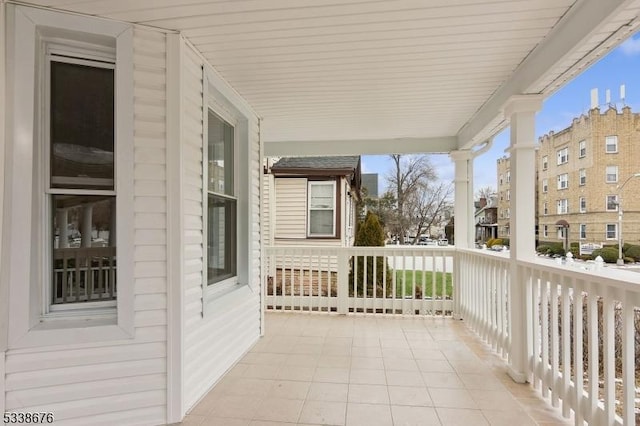 balcony featuring covered porch