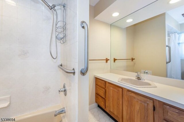 345 Center Grove Rd, Randolph Twp, NJ 07869 - bathroom featuring shower / tub combo with curtain and vanity