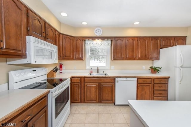 345 Center Grove Rd, Randolph Twp, NJ 07869 - kitchen featuring light tile patterned flooring, sink, and white appliances