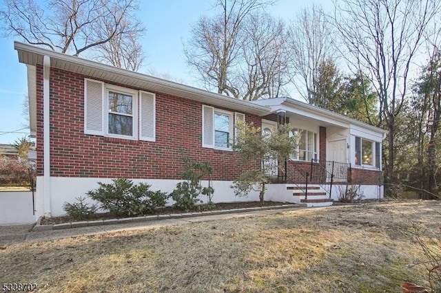 view of front of home with brick siding