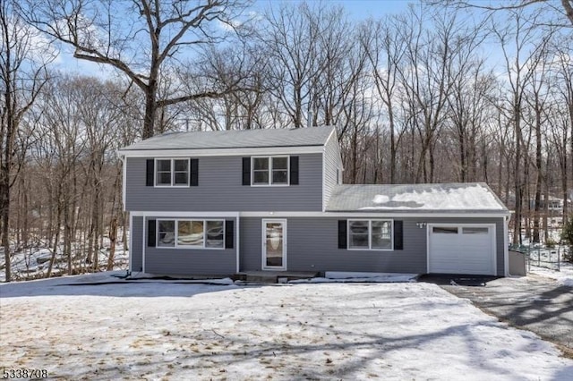 view of front property with a garage