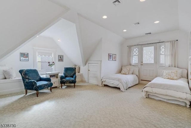 carpeted bedroom featuring vaulted ceiling