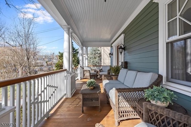 wooden deck featuring a porch