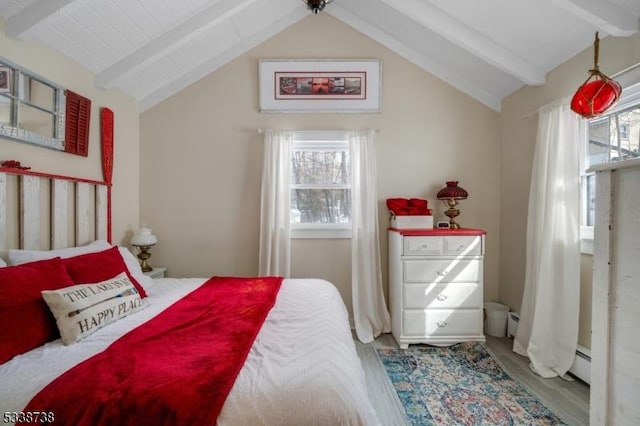 bedroom featuring vaulted ceiling with beams, multiple windows, and baseboard heating