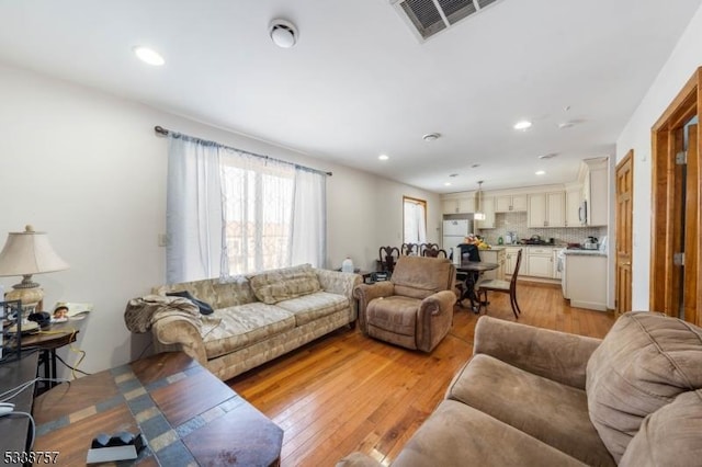 living room featuring light hardwood / wood-style floors