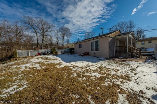 view of snow covered property